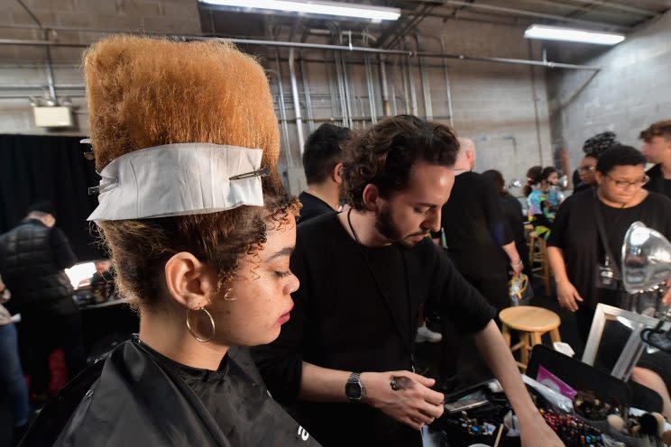 Models sported beehives with curled baby hairs. (Photo: Getty Images)