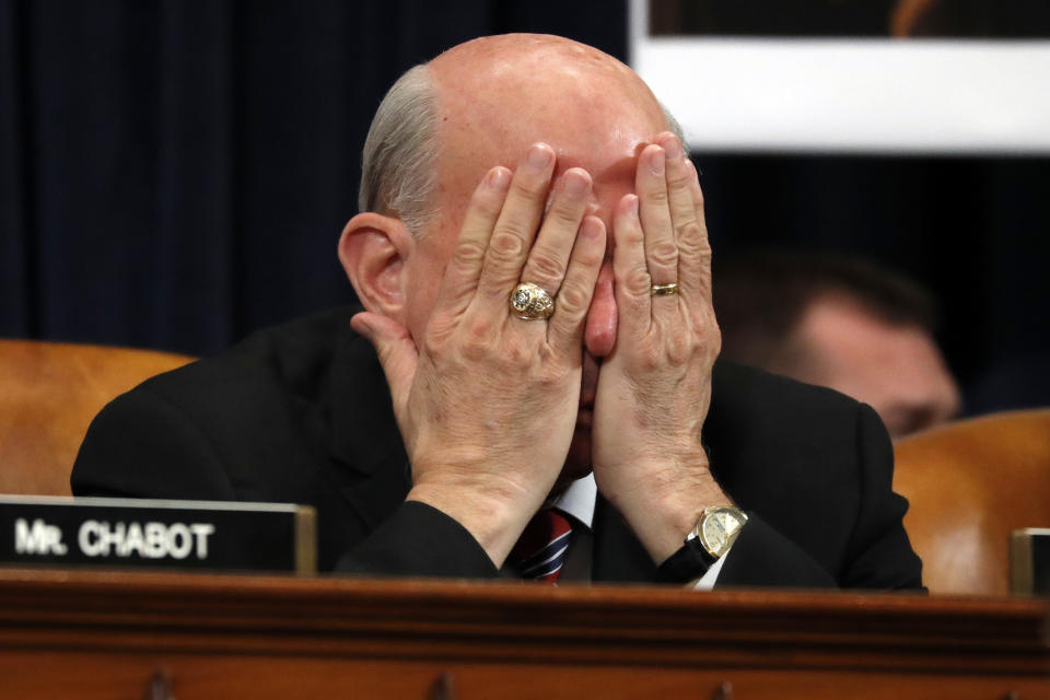 Rep. Louie Gohmert, R-Texas, rubs his face during a House Judiciary Committee markup of the articles of impeachment against President Donald Trump, Wednesday, Dec. 11, 2019, on Capitol Hill in Washington. (AP Photo/Jacquelyn Martin)