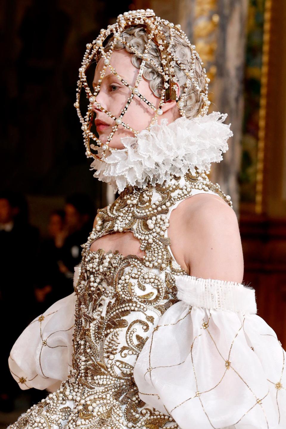 From ethereal white lashes to graphic sci-fi visors, a look back at the romantic beauty ideas on Sarah Burton's Alexander McQueen runway.