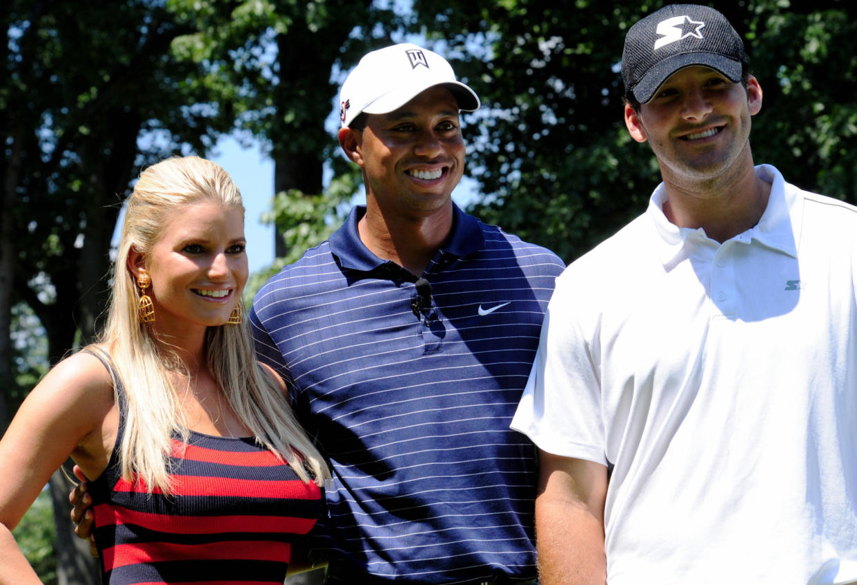 Jessica Simpson and Tony Romo at a golf tournament.