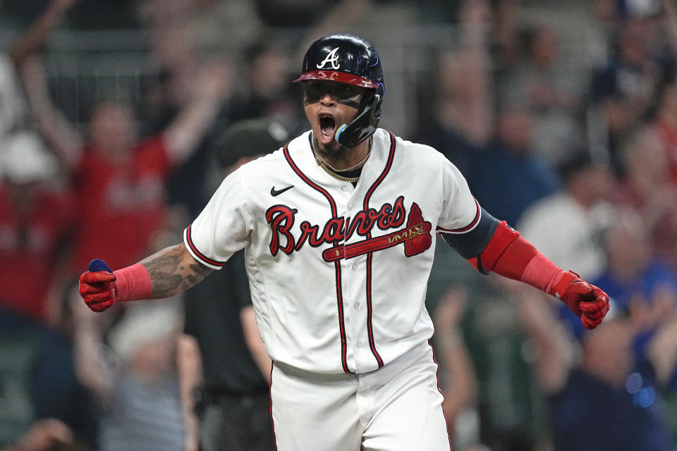 Atlanta Braves' Orlando Arcia reacts as he runs to first base after hitting a tying home run in the ninth inning of a baseball game against the New York Mets, Thursday, June 8, 2023, in Atlanta. (AP Photo/John Bazemore)