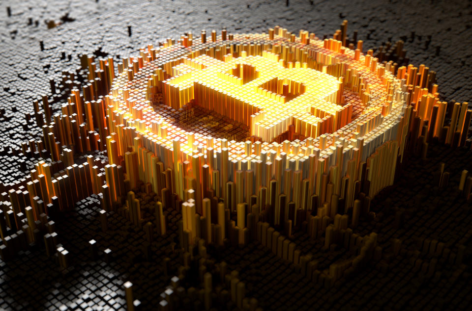 3-D mosaic of bitcoin symbol in gold surrounded by dark-grey mosaic bars.