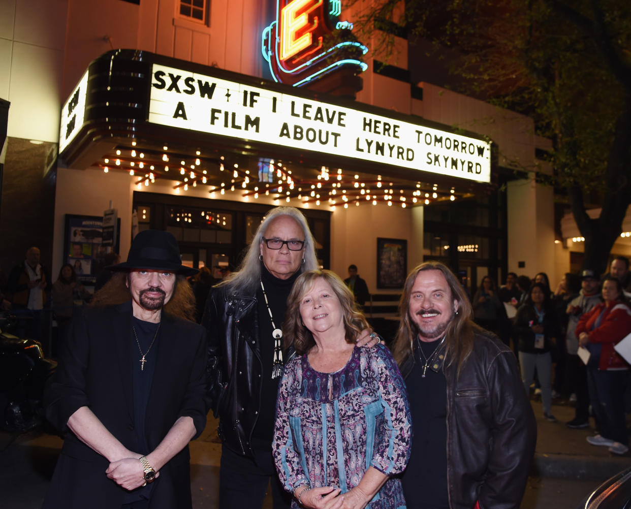 Lynyrd Skynyrd members Gary Rossington, Rickey Medlocke, and Johnny Van Zant attend the <em>If I Leave Here Tomorrow</em> movie premiere at SXSW 2018 with Ronnie Van Zant’s widow, Judy. (Photo: R. Diamond/Getty Images for CMT)