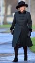 Camilla visits Bulford Camp in Wiltshire to welcome home the 4th Battalion dressed to beat the cold in a dark green coat, a black hat and gloves and a pair of black boots.