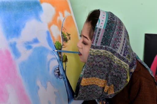 Unable to use her hands, arms, or legs, Afghan artist Robaba Mohammadi has defied unlikely odds in a country that routinely discriminates against women and disabled people