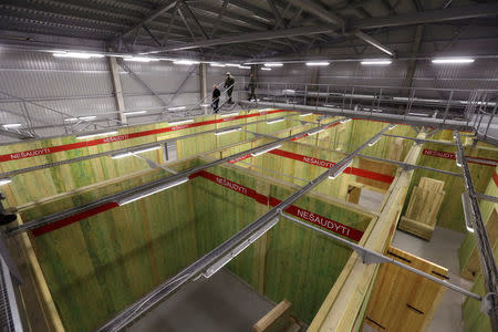 Lithuanian army officers and specialist inspect newly built premises for indoor urban warfare training in Pabrade, Lithuania, April 28, 2016. REUTERS/Ints Kalnins