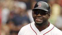 BOSTON, MA - JULY 7: David Ortiz #34 of the Boston Red Sox sticks out his tongue after scoring during the fourth inning of game one of a doubleheader against the New York Yankees at Fenway Park on July 7, 2012 in Boston, Massachusetts. (Photo by Winslow Townson/Getty Images)