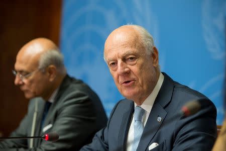 UN Special Envoy of the Secretary-General for Syria Staffan de Mistura (R) speaks at a news conference at Palais des Nations in Geneva, Switzerland, July 14, 2017. REUTERS/Xu Jinquan/Pool