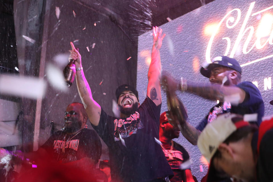 TORONTO, ON- JUNE 13 - Drake celebrates. Toronto fans watch, worry and celebrate at Jurassic park as the Toronto Raptors beat the Golden State Warriors in game six to win the NBA Championship at Oracle Arena in Oakland outside at Scotiabank Arena in Toronto. June 13, 2019. (Steve Russell/Toronto Star via Getty Images)