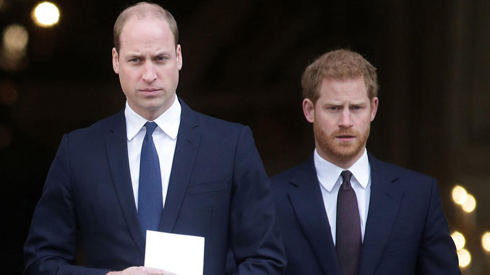 Prince William Prince Harry in sombre black suits