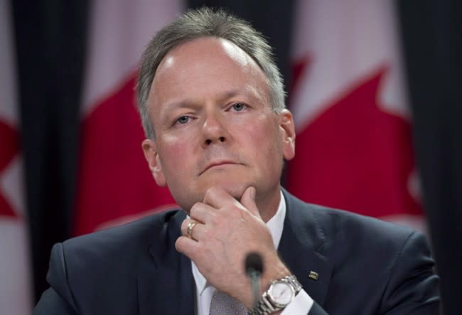 Bank of Canada Governor Stephen Poloz listens to a question as he speaks with the media at a press conference in Ottawa on July 17, 2013. The Bank of Canada is keeping its trendsetting overnight interest rate at one per cent. However, the bank shaved its forecast for economic growth this year, reducing its estimate for 2013 to 1.6 per cent from 1.8 per cent. THE CANADIAN PRESS/Adrian Wyld