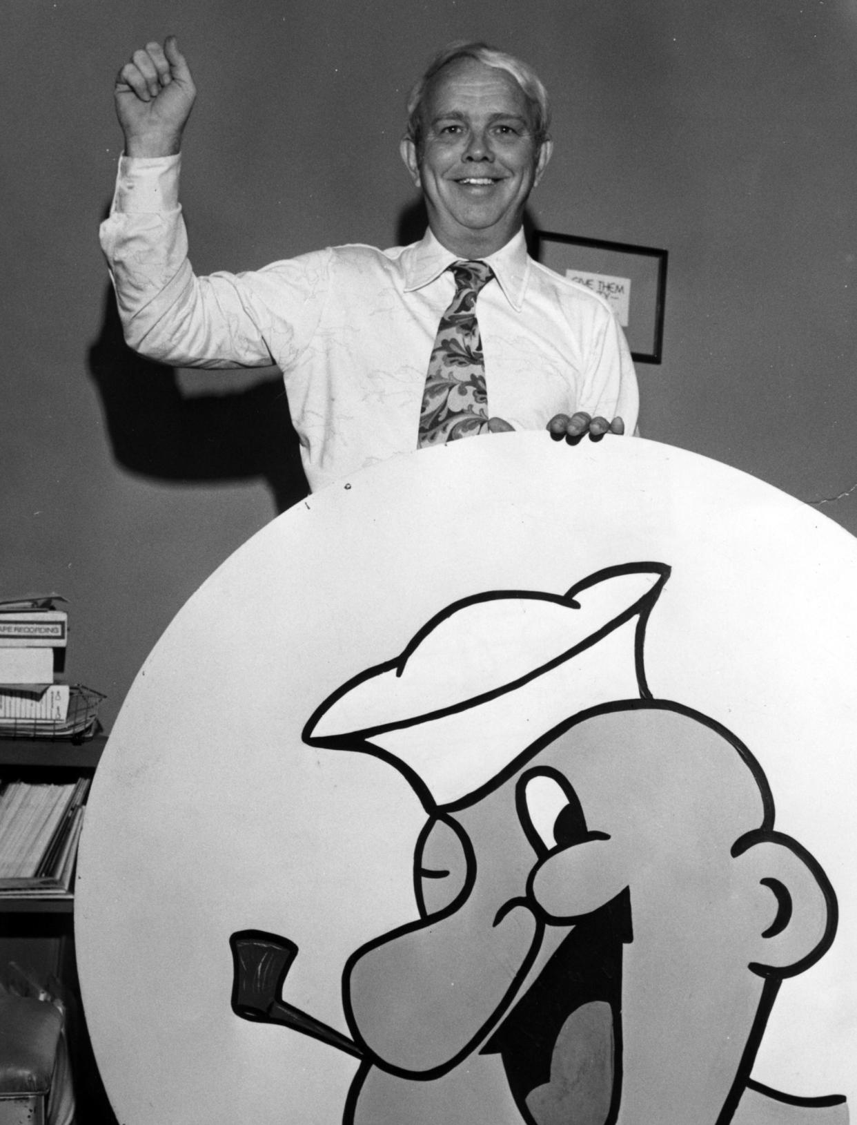 WTLV television's Ed McCullers, aka "Skipper Ed," stands behind a Popeye sign in this 1979 photo.