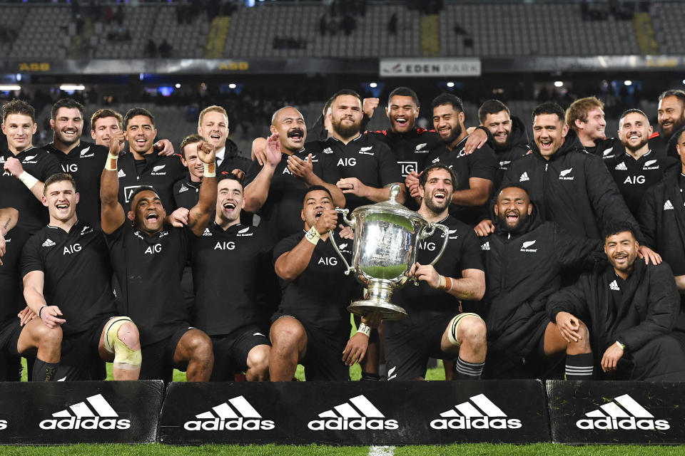 The New Zealand All Blacks celebrate after defeating Australia in the the second Bledisloe Cup rugby test at Eden Park in Auckland, New Zealand, Saturday, Aug. 14, 2021. (Jeremy Ward/Photosport via AP)