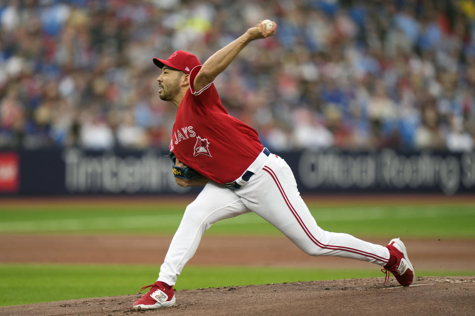 Toronto Blue Jays starting pitcher Yusei Kikuchi (16) throws against the Boston Red Sox during the first inning of a baseball game in Toronto on Saturday, July 1, 2023. (Frank Gunn/The Canadian Press via AP)