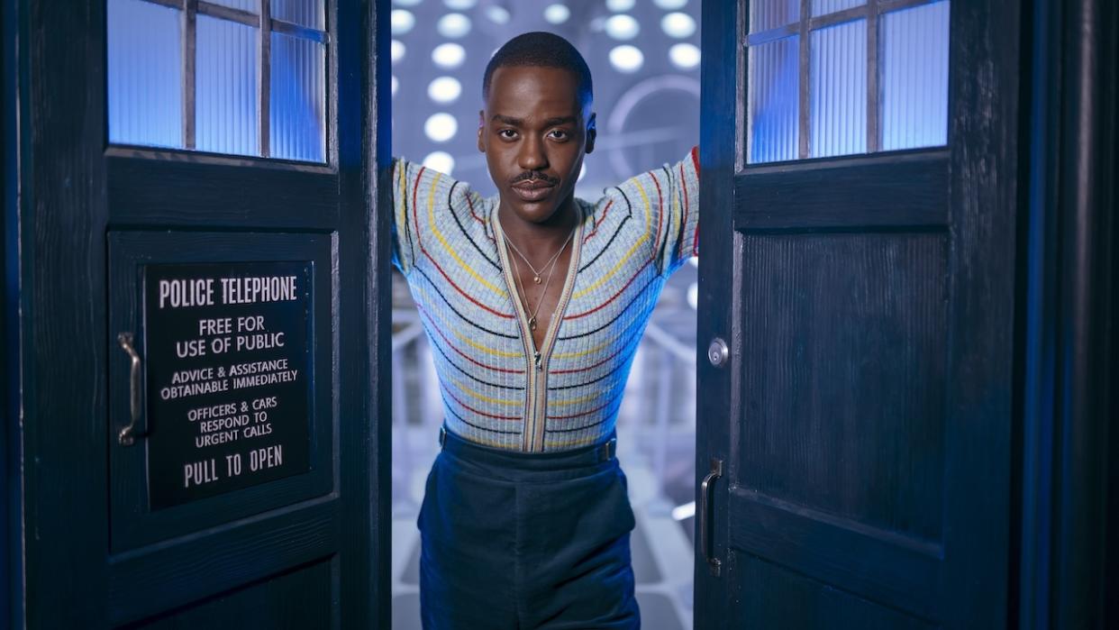  Ncuti Gatwa's Fifteenth Doctor opening the TARDIS' doors. 