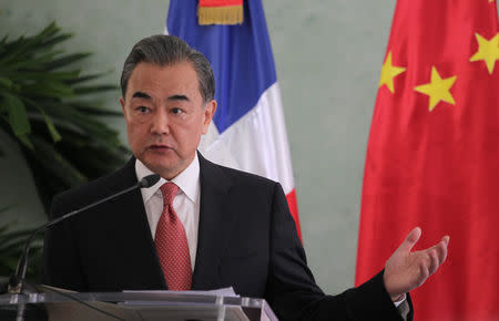 China's Foreign Minister Wang Yi talks to the media in Santo Domingo, Dominican Republic, September 21, 2018. REUTERS/Ricardo Rojas