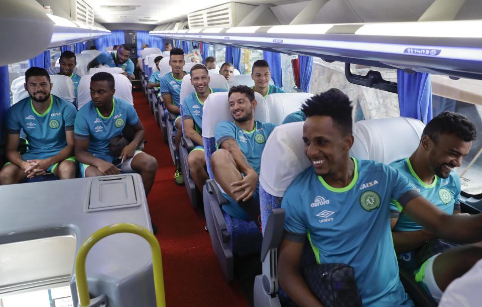 The new Chapecoense soccer team sits in a bus on their way to a training session in Chapeco, Brazil, Wednesday, Jan. 18, 2017. Three Chapecoense players survived and 19 players perished in an air crash that killed 71 people almost two months ago in Colombia. (AP Photo/Andre Penner)