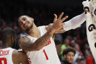 FILE - In this Jan. 14, 2020, file photo, Dayton's Obi Toppin (1) celebrates during the second half of the team's NCAA college basketball game against Virginia Commonwealth in Dayton, Ohio. Toppin and Dayton head coach Anthony Grant have claimed top honors from The Associated Press after leading the Flyers to a No. 3 final ranking. Toppin was voted the AP men's college basketball player of the year, Tuesday, March 24, 2020. Grant is the AP coach of the year. (AP Photo/John Minchillo, File)