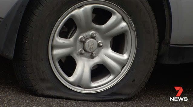 The father's tyres had been slashed in an attempt to prevent his son from getting away. Source: 7 News