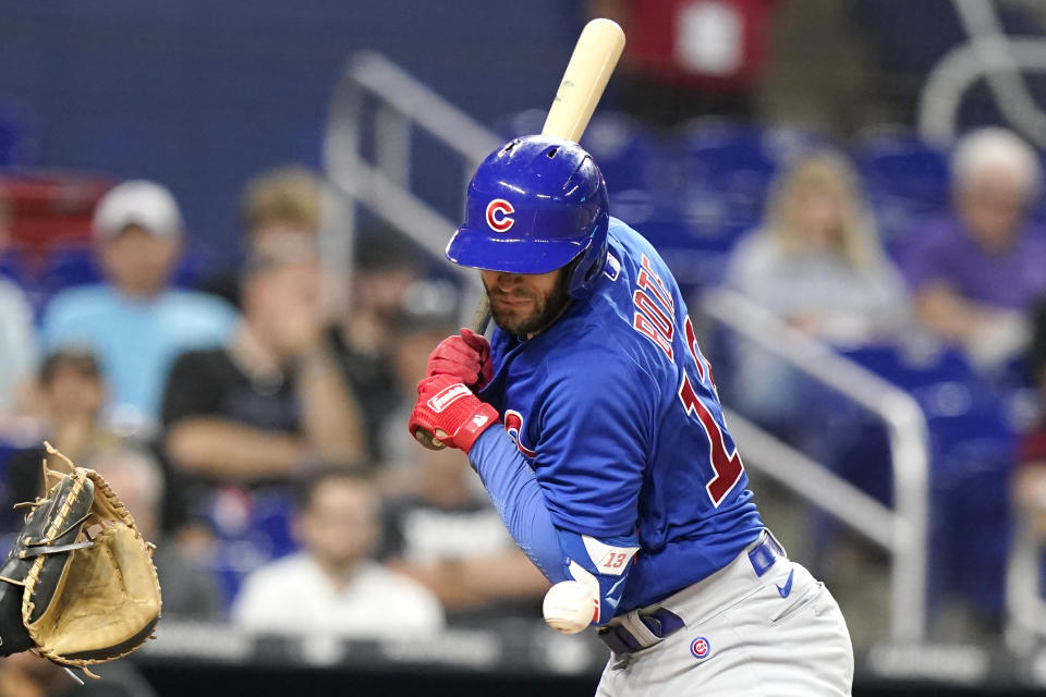 Chicago Cubs' David Bote is hit by a pitch from Miami Marlins starter Edward Cabrera during the fourth inning of a baseball game, Monday, Sept. 19, 2022, in Miami. (AP Photo/Lynne Sladky)
