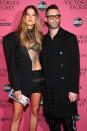 <p>Known for his modelizing ways before finally settling down, Levine, then 34, met Prinsloo, then 24, in June 2012 after he ended his relationship with Prinsloo’s close friend and fellow VS model Anne Vyalitsyna. The couple became engaged in 2013 and later <a rel="nofollow noopener" href="http://people.com/celebrity/adam-levine-married-maroon-5-rocker-weds-behati-prinsloo-in-mexico/" target="_blank" data-ylk="slk:tied the knot" class="link ">tied the knot</a> in 2014 in Los Cabos, Mexico. Prinsloo gave birth to baby girl <a rel="nofollow noopener" href="http://celebritybabies.people.com/2016/09/22/adam-levine-behati-prinsloo-welcome-daughter-dusty-rose/" target="_blank" data-ylk="slk:Dusty Rose" class="link ">Dusty Rose</a> in 2016, and gave birth to another daughter, <a rel="nofollow noopener" href="https://www.harpersbazaar.com/celebrity/latest/a18657945/behati-prinsloo-adam-levine-second-child/" target="_blank" data-ylk="slk:Gio Grace" class="link ">Gio Grace</a>, in February 2018. </p>