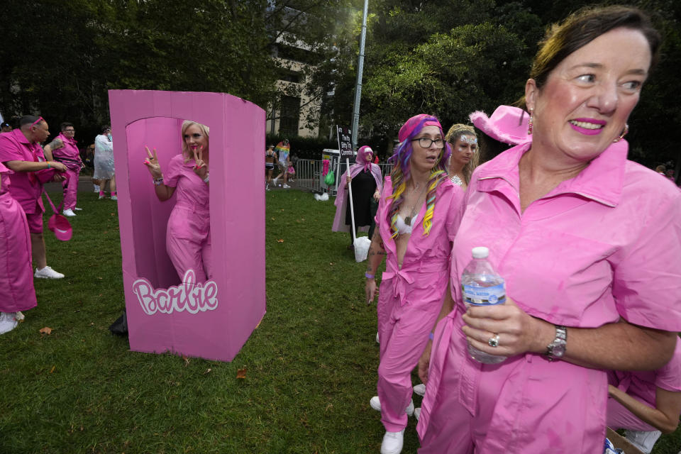 Barbie themed entrants prepare as 200 floats and thousands of people participate in the annual Gay and Lesbian Mardi Gras parade in Sydney, Saturday, March 2, 2024. (AP Photo/Rick Rycroft)