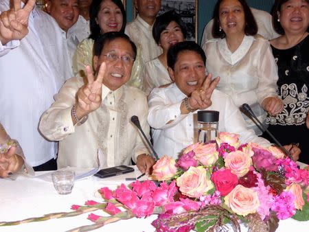 Luis Jalandoni (L), negotiator for the communist National Democratic Front of the Philippines, sits with government peace negotiator Silvestre Bello at the start of a round of peace talks in Oslo, Norway, August 22, 2016. REUTERS/Alister Doyle