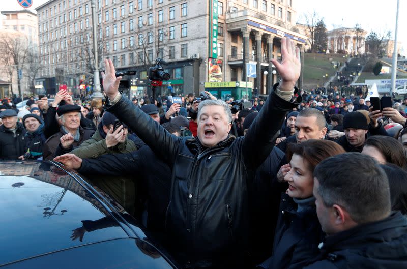 Ukraine's former President Petro Poroshenko takes part in a rally ahead of the so-called "Normandy" format summit, in Kiev