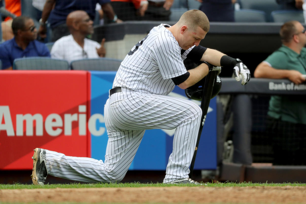 NEW YORK, NY - SEPTEMBER 20:  Todd Frazier #29 of the New York Yankees reacts after a child was hit by a foul ball off his bat in the fifth inning against the Minnesota Twins on September 20, 2017 at Yankee Stadium in the Bronx borough of New York City.  (Photo by Abbie Parr/Getty Images)