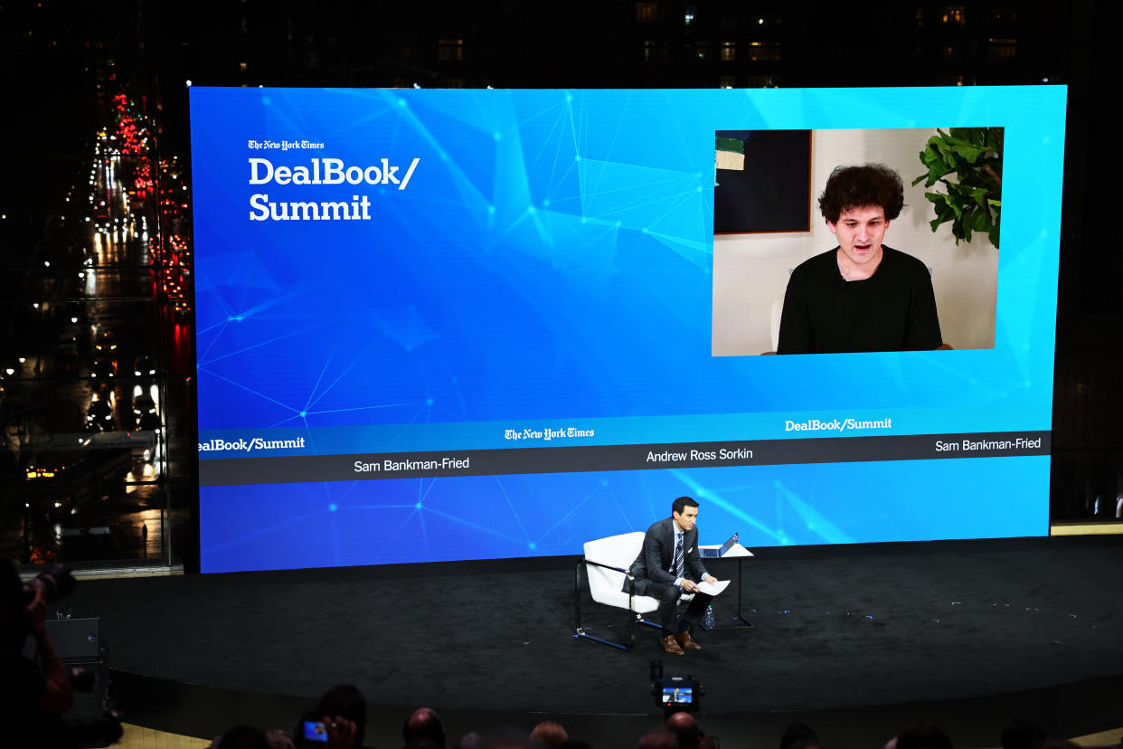 NEW YORK, NEW YORK - NOVEMBER 30: Andrew Ross Sorkin speaks with FTX founder Sam Bankman-Fried during the New York Times DealBook Summit in the Appel Room at the Jazz At Lincoln Center on November 30, 2022 in New York City. The New York Times held its first in-person DealBook Summit since the start of the coronavirus (COVID-19) pandemic with speakers from the worlds of financial services, technology, consumer goods, private investment, venture capital, banking, media, public relations, policy, government, and academia.   (Photo by Michael M. Santiago/Getty Images)