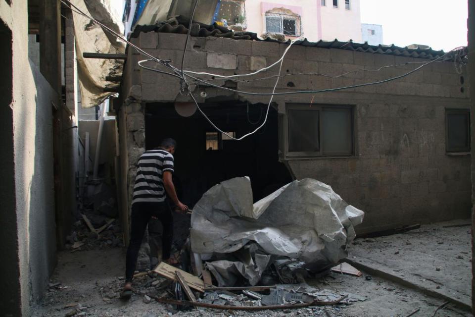 Palestinian citizens inspect damage to their homes caused by Israeli airstrikes on October 08, 2023 in Gaza City, Gaza. After the attack launched by Hamas on Israel yesterday, which surprised them, Israeli Prime Minister Benjamin Netanyahu asked the Palestinians to leave Gaza, and warned that the army would turn Hamas positions “into rubble.” 