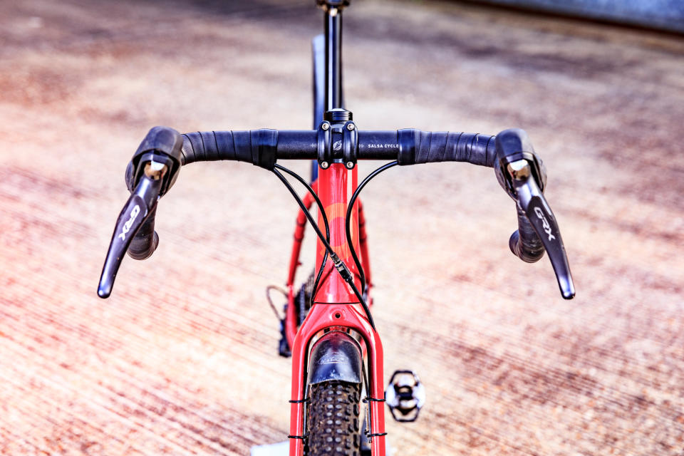 Image shows a person riding their first gravel bike.