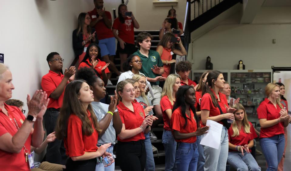 Students clap after a performance by Leon High School chorus students at a reunion for the class of 1951 Saturday, Sept. 17, 2022.