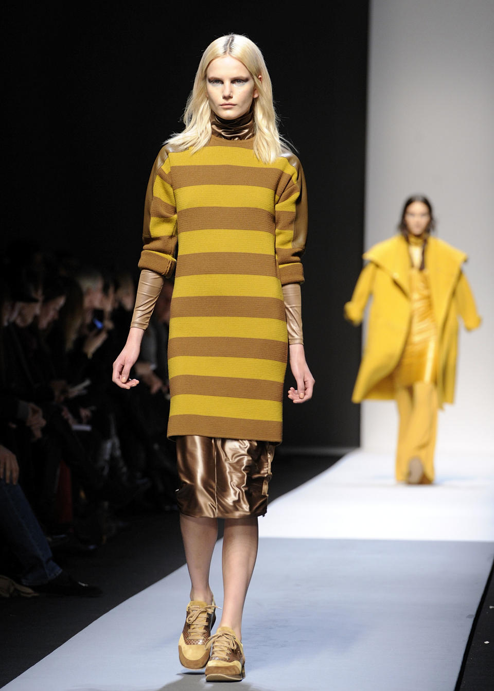 A model wears a creation for Max Mara women's Fall-Winter 2013-14 collection, part of the Milan Fashion Week, unveiled in Milan, Italy, Thursday, Feb. 21, 2013. (AP Photo/Giuseppe Aresu)