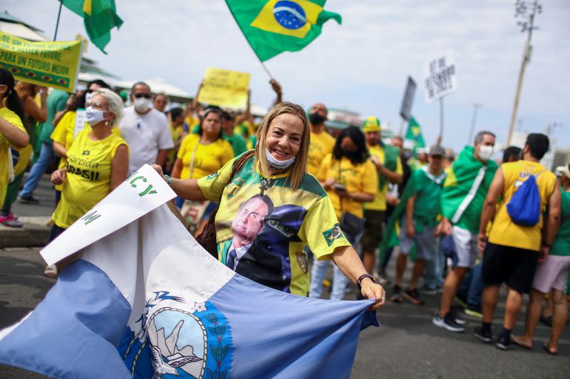 President Bolsonaro supporters march in support of his attacks on the country's Supreme Court, in Brasilia