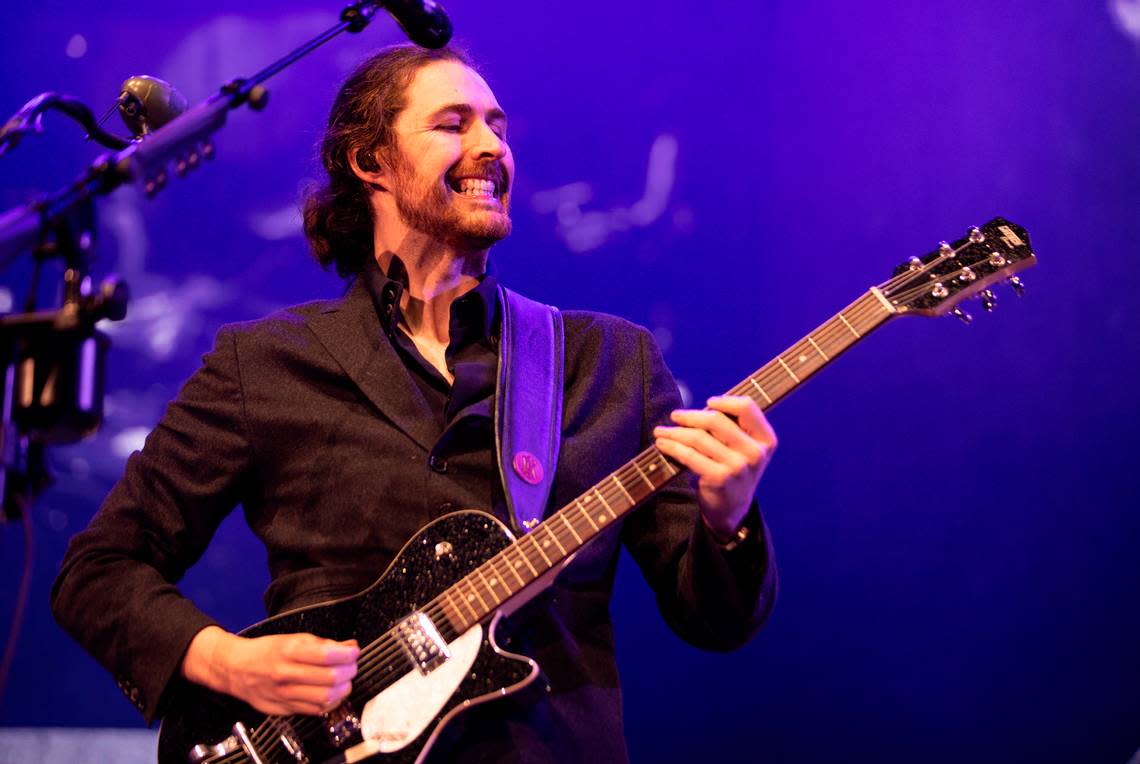 Hozier smiles as he and his band wow the crowd in concert at Coastal Credit Union Music Park at Walnut Creek in Raleigh, N.C., Saturday night, April 20, 2024.