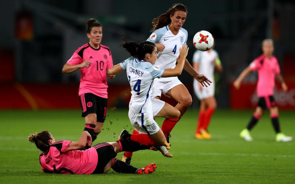 Karen Carney (C) became the first England player to feature in seven consecutive international tournaments when she came on against Scotland - Getty Images Europe