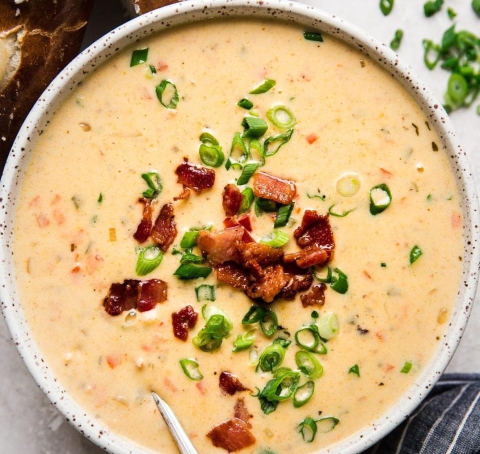 Creamy beer cheese soup with pretzels and crispy pancetta will be the first of six courses paired with Revelation Craft Brewing Co.’s beer on March 9, 2023, at The Room at Cedar Grove in Lewes.