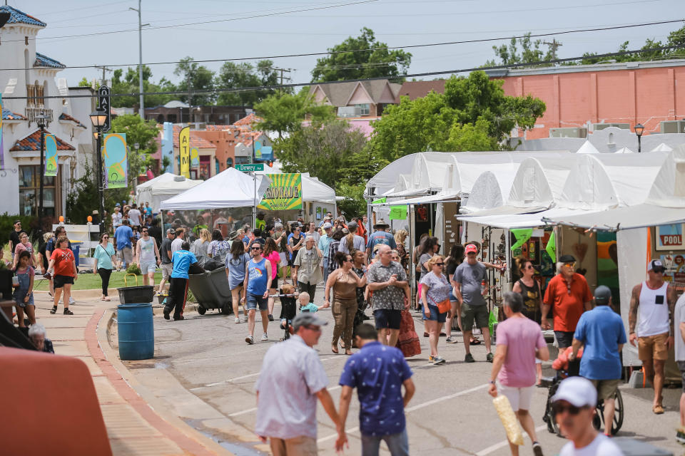 Festival-goers shop at the 2022 Paseo Art Festival in Oklahoma City.