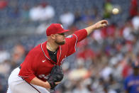 Washington Nationals starter Jon Lester delivers a pitch during the fourth inning of the second baseball game of the team's doubleheader against the New York Mets, Saturday, June 19, 2021, in Washington. (AP Photo/Nick Wass)