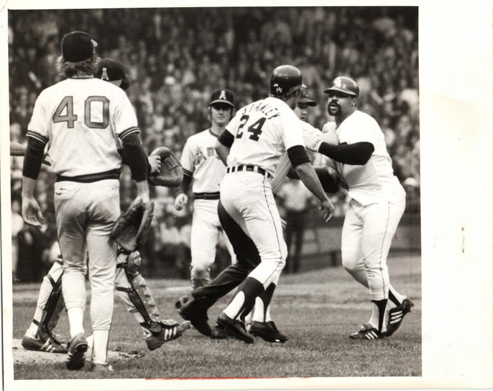 Tigers' Mickey Stanley steps between Willie Horton, right, and Angels' Frank Tanana (40) during the fourth inning of Game 1 of a doubleheader June 11, 1975 at Tiger Stadium. Benches cleared, Horton was ejected and action was halted for 20 minutes.