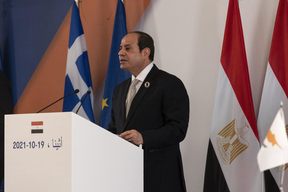 Egypt's President Abdel Fattah al-Sisi makes statements during a joint news briefing with Greece's Prime Minister Kyriakos MItsotakis and Cyprus' President Nicos Anastasiades, not pictured, in Athens, Greece, Tuesday, Oct. 19, 2021. Athens hosts the 9th trilateral meeting between the three countries. (AP Photo/Yorgos Karahalis)