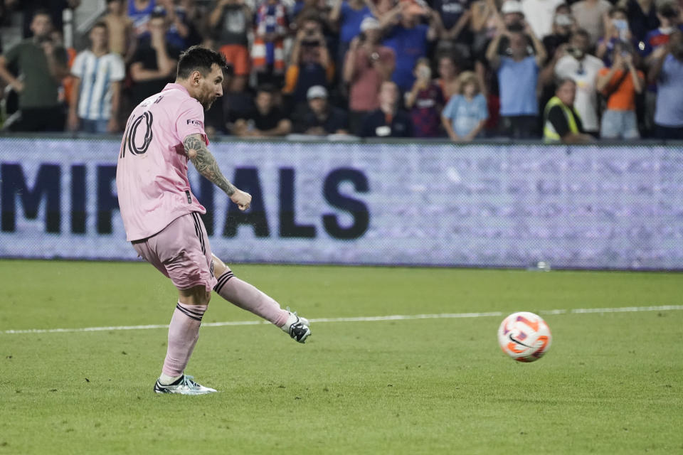 Inter Miami forward Lionel Messi takes a penalty kick in extra time of a U.S. Open Cup semifinal soccer match against FC Cincinnati, Wednesday, Aug. 23, 2023, in Cincinnati. Inter Miami defeated FC Cincinnati, 5-4, on penalty kicks. (AP Photo/Joshua A. Bickel)