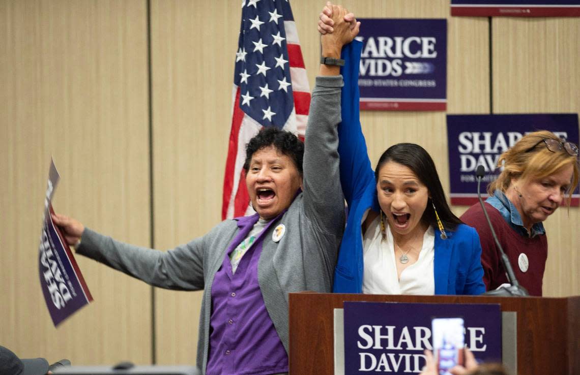 Kansas 3rd District Rep. Sharice Davids, right, celebrates with her mother Crystal Herriage after she defeated Republican challenger Amanda Adkins to retain her seat in Congress Tuesday, Nov. 8, 2022, at her Davids’ watch party at the Sheraton Hotel in Overland Park.