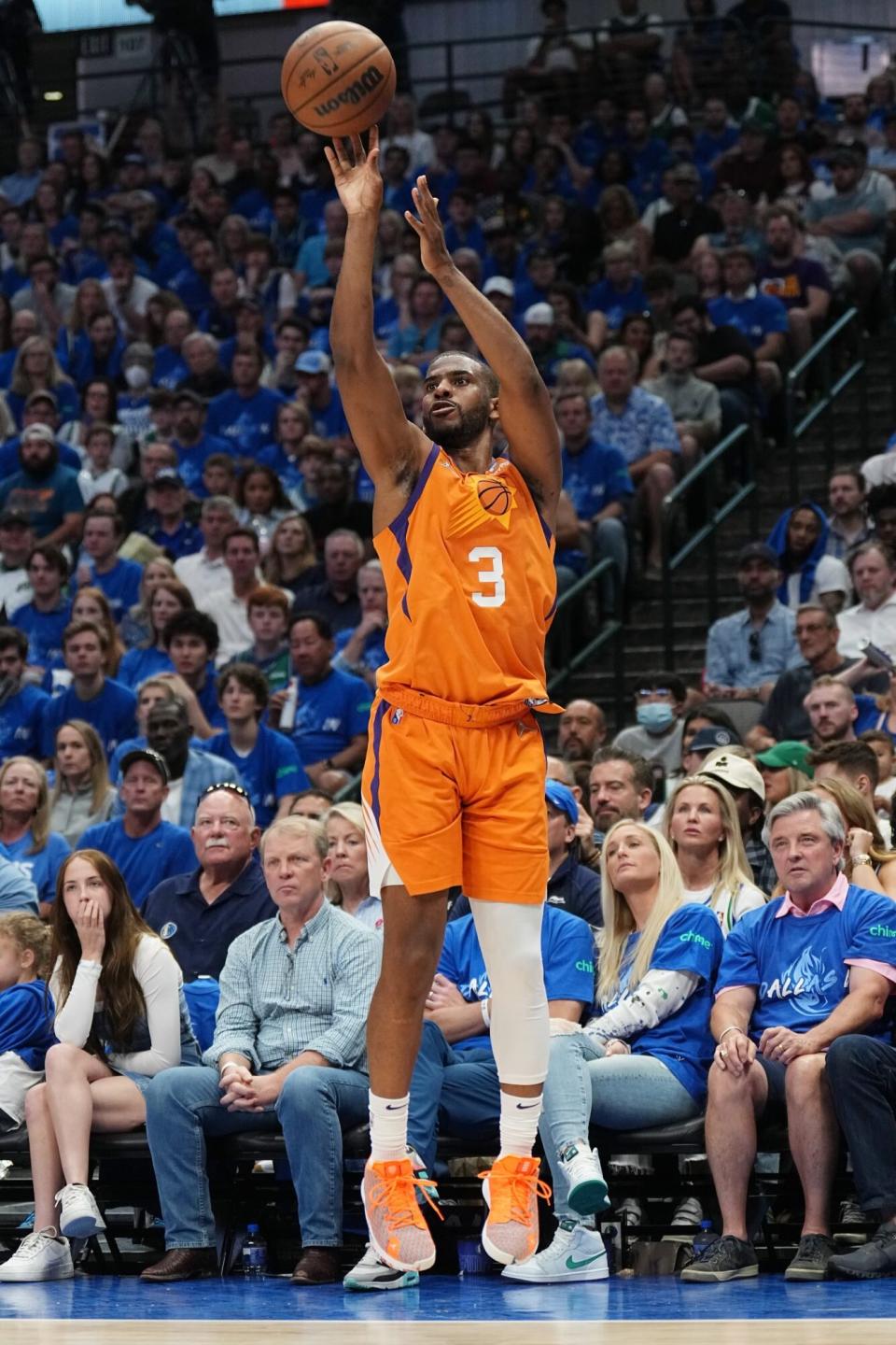 DALLAS, TX - MAY 8: Chris Paul #3 of the Phoenix Suns shoots a three point basket during the game against the Dallas Mavericks during Game 4 of the 2022 NBA Playoffs Western Conference Semifinals on May 8, 2022 at the American Airlines Center in Dallas, Texas. NOTE TO USER: User expressly acknowledges and agrees that, by downloading and or using this photograph, User is consenting to the terms and conditions of the Getty Images License Agreement. Mandatory Copyright Notice: Copyright 2022 NBAE (Photo by Glenn James/NBAE via Getty Images)