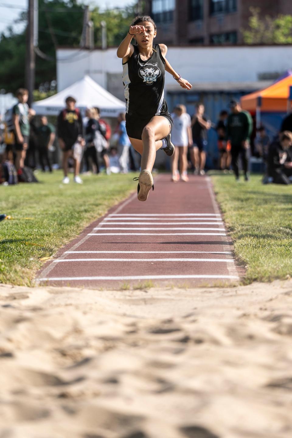 Raegan Bossard from Immaculate Conception High School competes in the triple jump during the Lou Lanzalotto Bergen Meet of Champions at Hackensack High School on Friday, May 19, 2023.