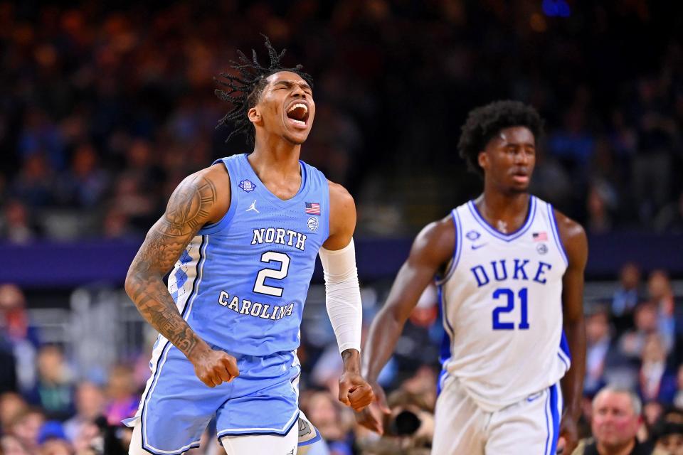 North Carolina Tar Heels guard Caleb Love (2) reacts after a play against the Duke Blue Devils during the first half during the 2022 NCAA men's basketball tournament Final Four semifinals at Caesars Superdome.
