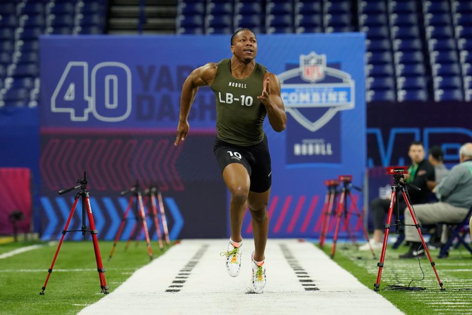 Washington State linebacker Daiyan Henley runs the 40-yard dash at the NFL football scouting combine in Indianapolis, Thursday, March 2, 2023.