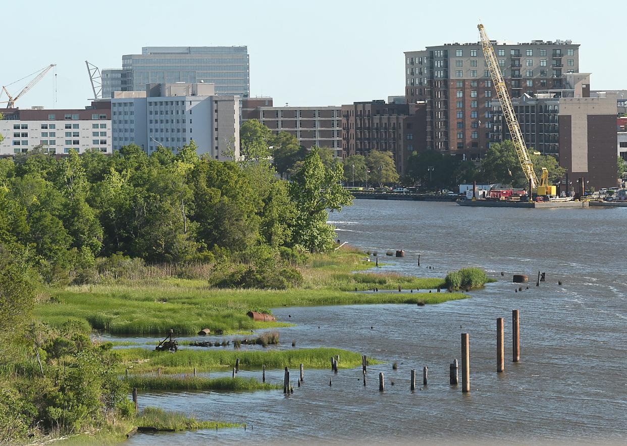 Views of downtown Wilmington from along the west bank Cape Fear River and the  Battleship Tuesday May 10, 2022 in Wilmington, N.C.