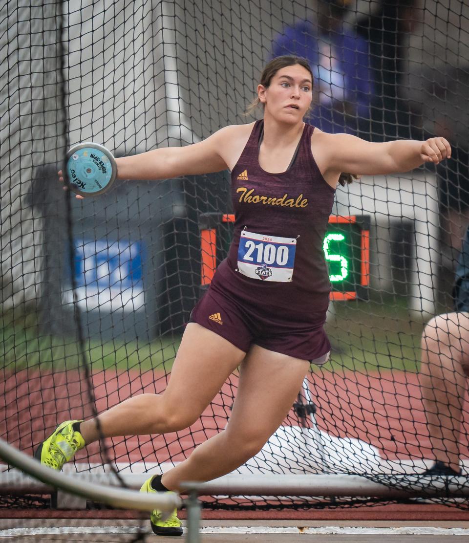 Thorndale's Bethany Preusse hurls the discus on her way to a silver medal in the Class 2A event Friday.
